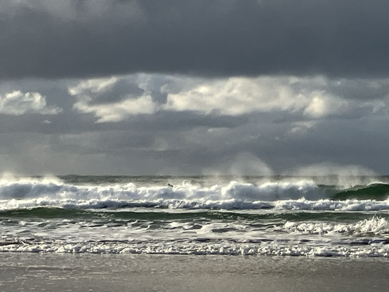 More. Stormy sea with white horses.
