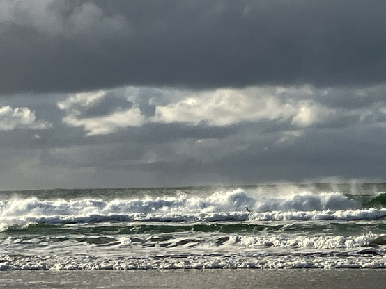 More. Stormy sea with white horses.
