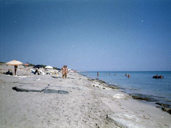 View of a beach on the Ionian Sea in Apulia while it starts populating in the morning. Shot on Lomography LomoChrome Color ‘92 35mm analogue film with a Yashica T4 camera.