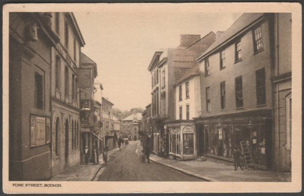 Printed monochrome postcard showing a view of Fore Street in Bodmin, Cornwall.
Published by E. & H.G. Liddell, Turret House, Bodmin, RA Series, not numbered, c.1920s.
Postally unused.
Very good condition, with slight corner bumps.