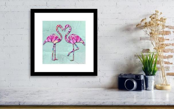 Two pink flamingos on light blue by artist Sharon cummings.
