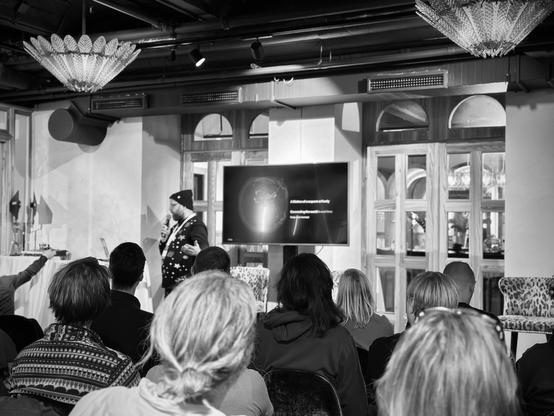 Fastly engineer presenting the edge network architecture in a hotel space.