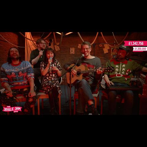 A screengrab from TLJ's appearance on Jingle Jam last night, having a jolly time (including Robbie, even though he's staring off into the distance like a haunted soldier).
