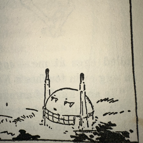 A round building with two towers and dormer windows. Looks like a small creature with up stretched arms and a meh face.