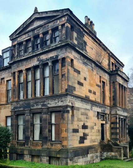 A ancient Greek-style terminal pavilion of a Victorian terrace in Glasgow.