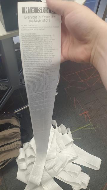An extremely long receipt, starting with "Nix Store", "Everyone's favorite package store", "You were looking for: /etc/nixos#nixosConfigurations.Infini-FRAMEWORK.config.system.build.toplevel", "Your closure today:",

Then the entire NixOS path closure for that flake output, totaling 5930 store paths