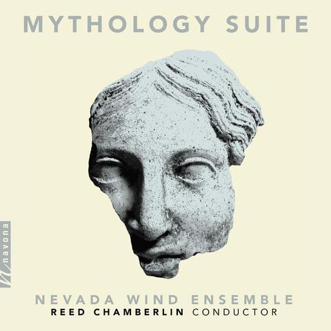Cover of Nevada Wind Ensemble’s Navona Records album “Mythology Suite”, featuring a fragment of a mask set on a yellow background.