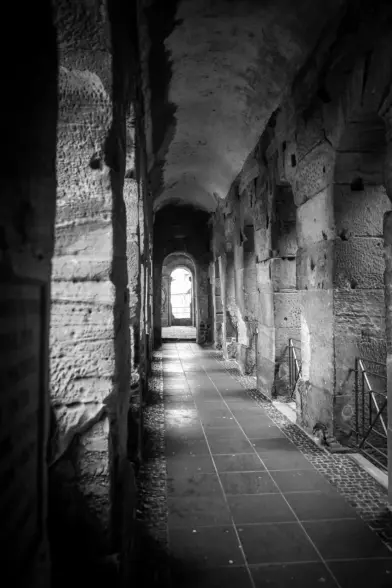 a photograph of a passage connecting the eastside with the westside of Porta Nigra