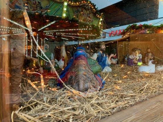 nativity scene vs fairground lights