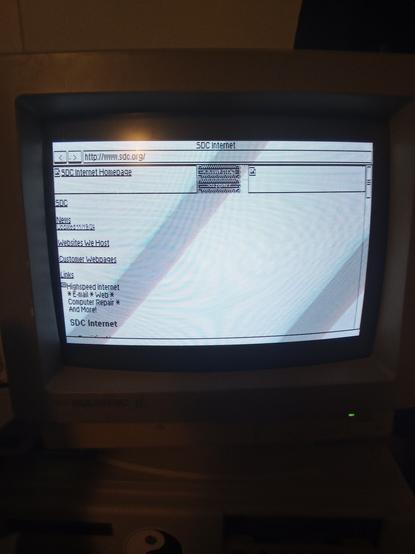 My local ISP main web page as rendered by microweb. Some pics didn't load at all and some look like rectangles filled with static.