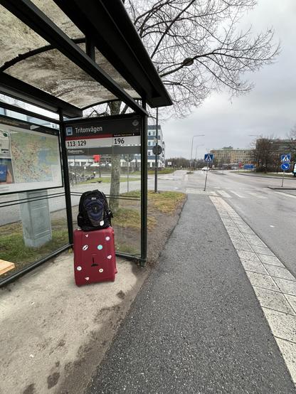 Bags waiting for the bus at bus stop