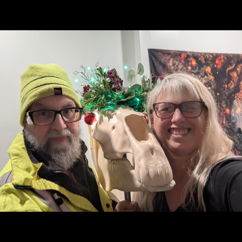 My husband and I with the Mari Lwyd head between us.