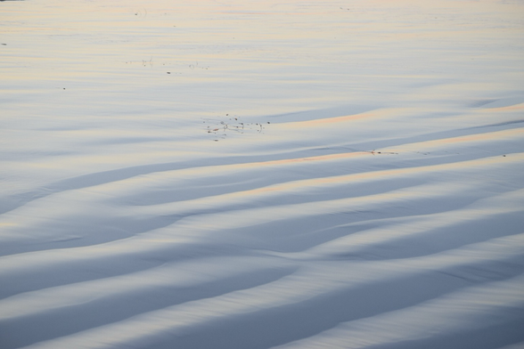 Sundown’s pastel colored ripples in the sands on Pacific Beach