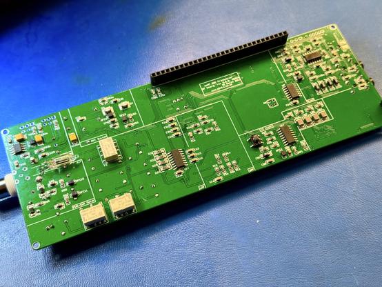 Full view of the front of the mcHF RF board. With the connectors, relays, neon bulb and the balun installed.