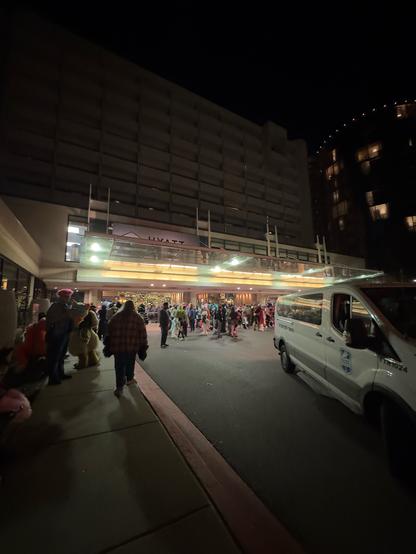 Hyatt Regency O’Hare main entrance. Many furries are crowding the area.