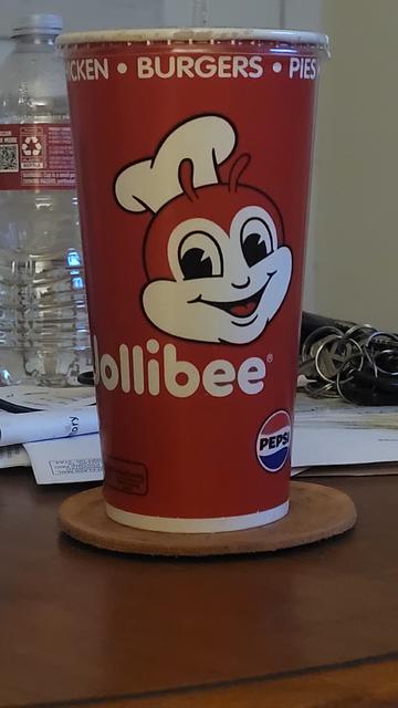 Jollibee cup with a Pepsi logo on it. 
#jollibee