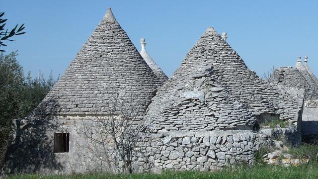 Circular, stone-built homes, with conical, stone rooves