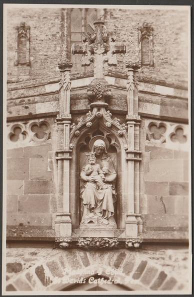 Sepia real photographic postcard showing a view of the statue of the Madonna and Child at St David's Cathedral in Pembrokeshire.
Publisher not stated, not numbered, c.1930.
Postally unused.
Very good condition, with very slight corner bumps.