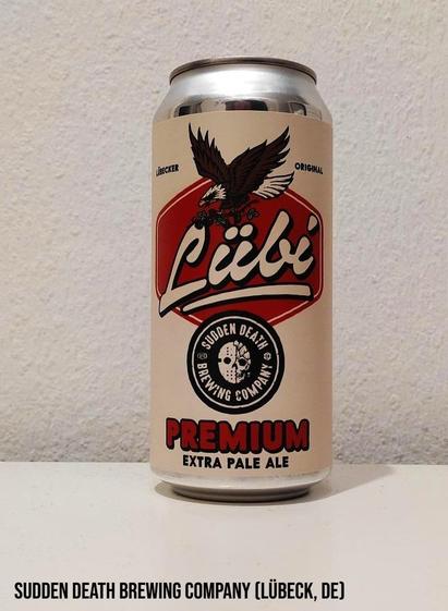 A beige and red can. Apart from the company Logo, the label shows an eagle carrying the name of the beer in its claws.