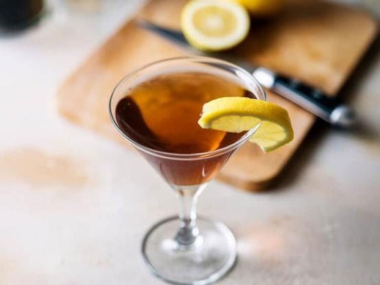 Moon Quake Shake cocktail with lemon wheel garnish