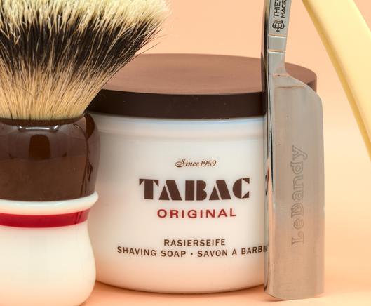 A Stank Tank® with matching brush and a pretty TI Le Dandy razor