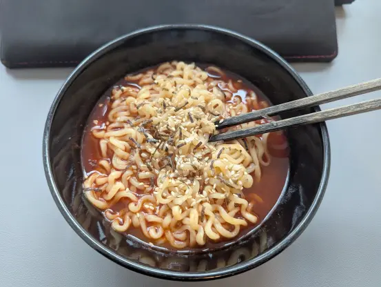 Buldak Noodles in a black bowl