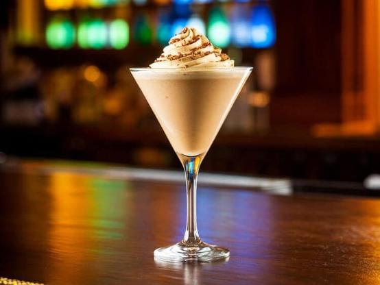 Butter Chocolate Bliss drink in cocktail glass with whipped cream