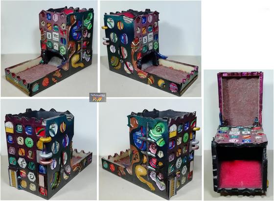 Alien themed dice tower. Irregular shapes and colours, covered with glyphs. The numerals are from a variety of number systems and count up to 20 (XX).