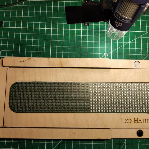 Pcb of led matrix sitting in a wooden 'craddle' (to keep it in place). Half of the fotprints are filled with ws2812b leds in 2020 package. That 324 leds.
323 footprints are still empty