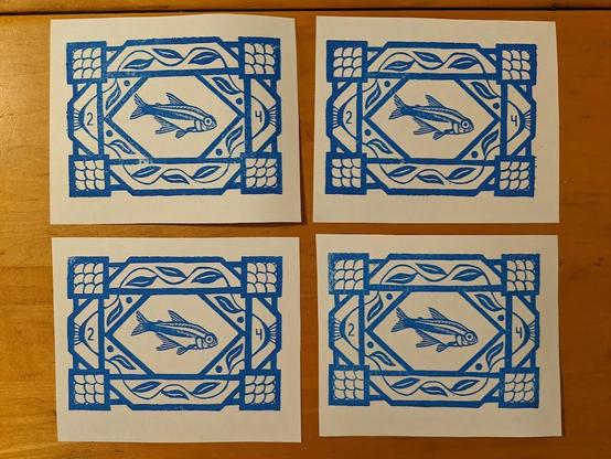 Four prints made using the block shown previously.