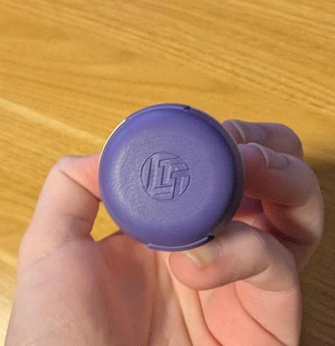 The cap of the ltt screwdriver, with the LTT logo.