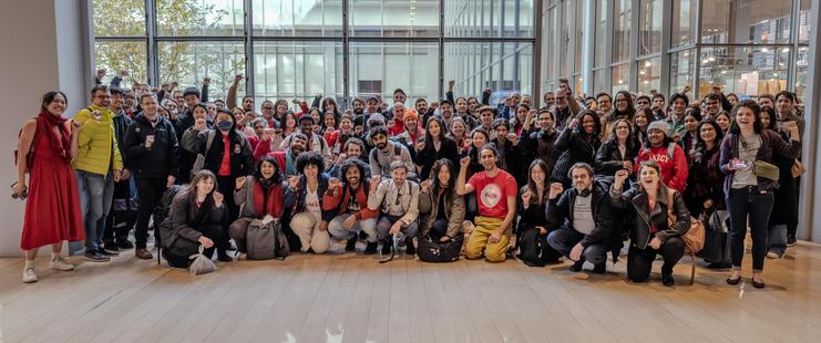 A group photo of Times Tech Guild members in the lobby of The New York Times building in Midtown Manhattan, taken on Monday, November 12th, 2024 as the unit returned to work after an eight-day unfair labor practice strike.