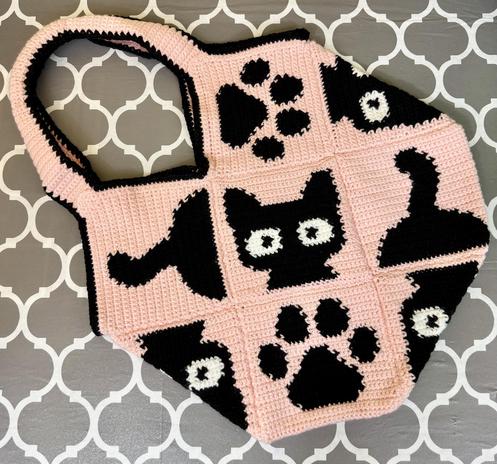 Large Crazy Cat project or Diaper bag! 100% acrylic yarn trimmed with cotton on the handles to keep them from stretching! The handles are also padded for ease and a comfortable carry!