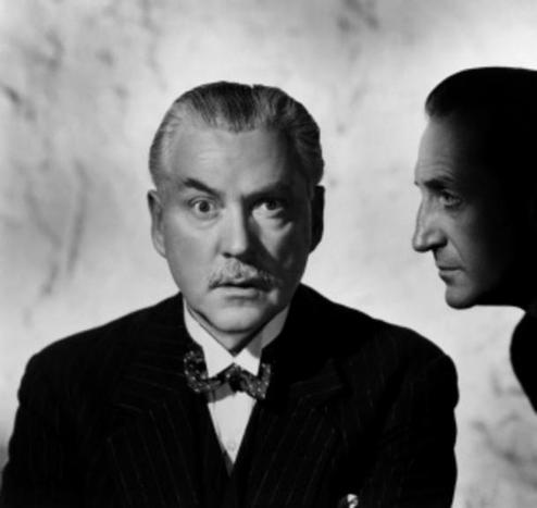 Movie publicity shot of Nigel Bruce as Doctor Watson & Basil Rathbone as Sherlock Holmes.