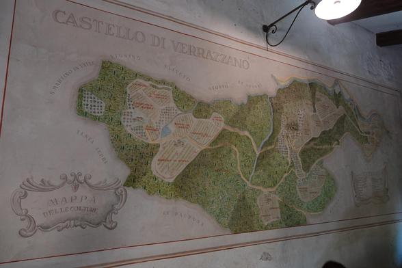 A historic map of the winery on display in a room.