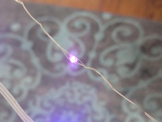 A close up shot of the old style string showing the individual wires and the almost impossibility of getting all the wires running straight and clean.