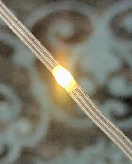A close up shot of the new style showing the nice clean, straight wiring achieved by the 'ribbon' cable and also showing the more diffuse bulb.