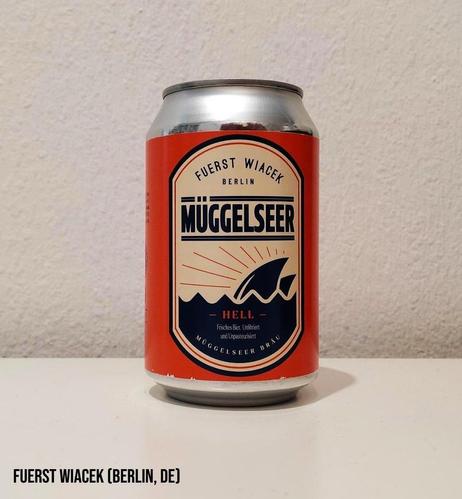 An orange can with a relatively simple label in retro style.