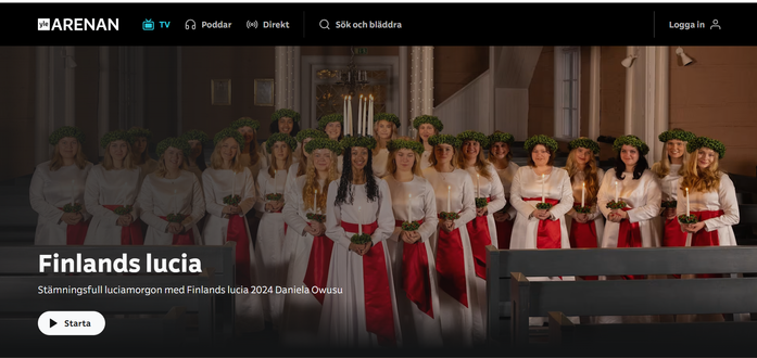 Kuvakaappaus Yle Arenanin etusivulta. Kuva vuoden Luciasta ja hänen kulkueestaan. Lucia on ei-valkoinen.