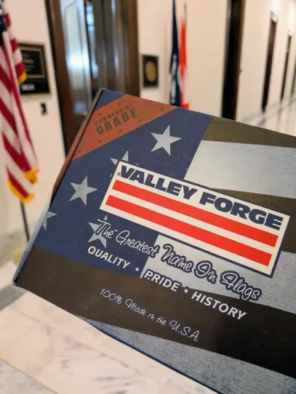 An American flag in a Valley Forge Flag Co. cardboard box, held in a hallway of the Russell Senate Office Building outside the office of Sen. Tim Kaine (D.-Va.)