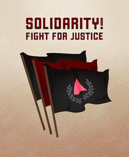 in all caps: ‘Solidarity in the Fight for Justice’; “in the” is written vertically to make an exclamation after the word solidarity. from a distance, the art can be read: “Solidarity! Fight for Justice”

this text floats above 3 waving flags: black, red and the third black with the commie pinko fag logo [grey wreath of laurels cupping an inverted pink triangle]
