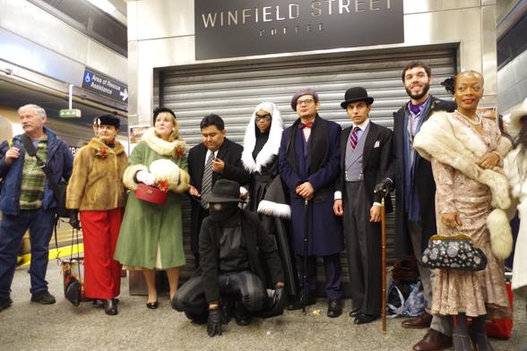 December 8th. At 96th Street station, those dressed for the day gather for a group photo on the platform.