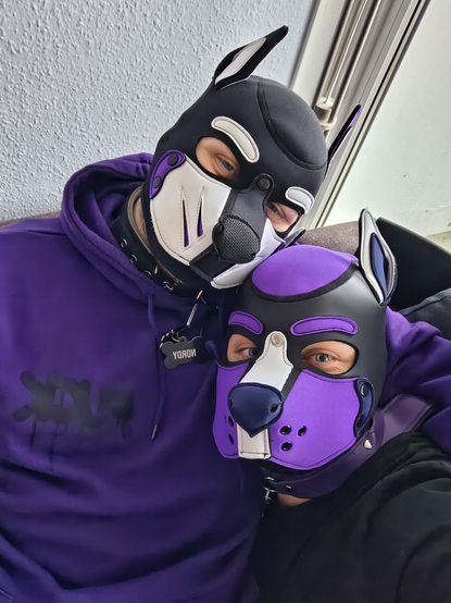 Two petplayer cuddling and taking a selfie