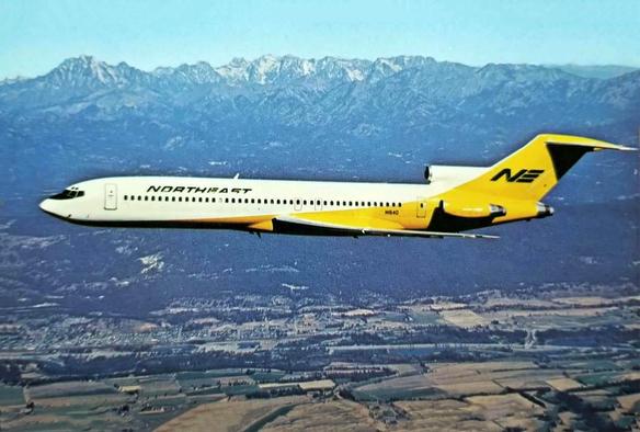 727 flying right to left. It has its Yellow tail livery