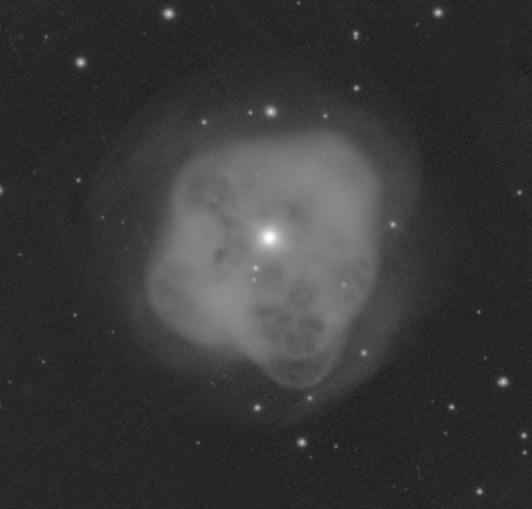 The same planetary nebula, except with almost all of the most distracting cosmetic defects removed. It's much easier to look at. When comparing it to the previous image, it is very satisfying.
