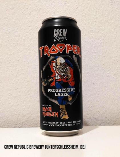 A black 500 ml can prominently featuring Iron Maiden's iconic mascot "Eddie", wearing a red uniform and holding a "hop hand grenade" (a term coined by Crew Republic) in his right hand.