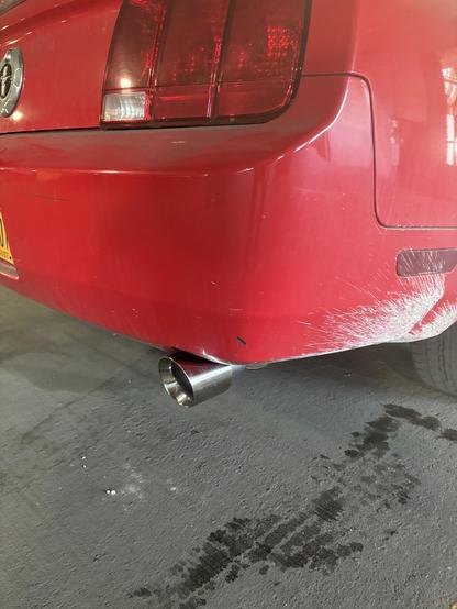 An After picture of my new exhaust with chrome tip. The muffler is 3.5 inches, which is better, but also has a separate chromed, flared tip to 4.5 inches which looks great and sounds great.