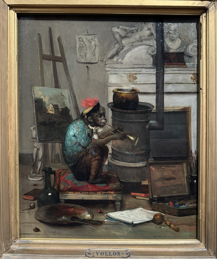 photo of the painting in gold frame at museum “In this study of an artist's studio, Vollon creates an allegory of the liberal arts. The score and trumpet represent music, the books philosophy, the canvas on the easel painting, and the various works scattered throughout the studio sculpture. At the rear are casts from Michelangelo's Medici tombs in Florence, and of Minerva, the Roman goddess of the arts. In depicting a monkey as an artist, Vollon evokes a seventeenth-century Dutch tradition of satirizing the artist as imitator of nature, or ‘art as the ape of nature.’” https://www.philamuseum.org/collection/object/101795