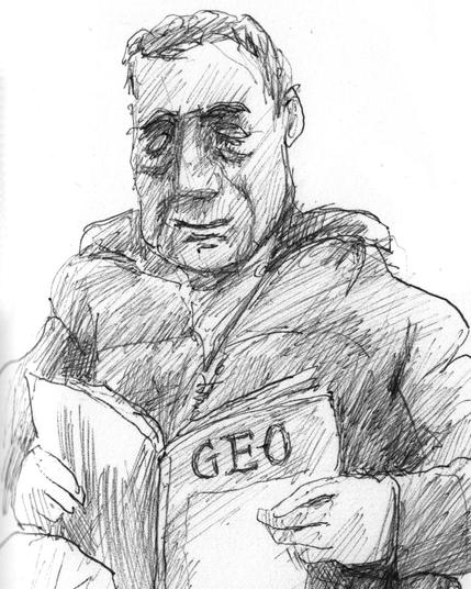 Man reading a magazine
