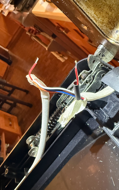 A control wire that wore through by opening and closing the door "too many times" (normal wear & tear on an appliance with a door). Glad it's low voltage, at least, and didn't burn down my house.